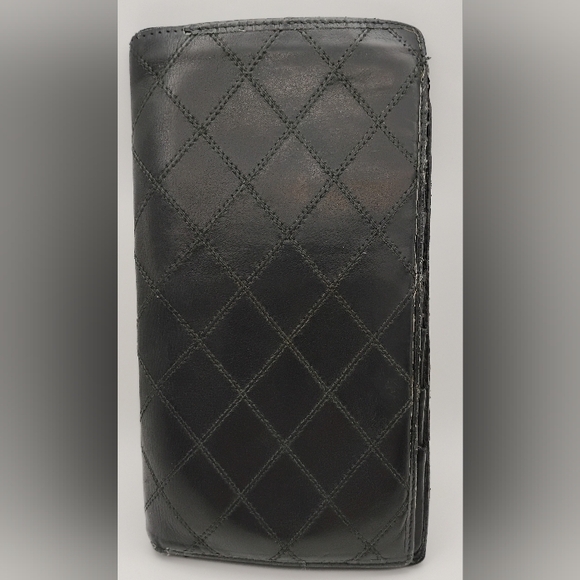 CHANEL Handbags - CHANEL Vintage Black Quilted Leather Long Wallet
